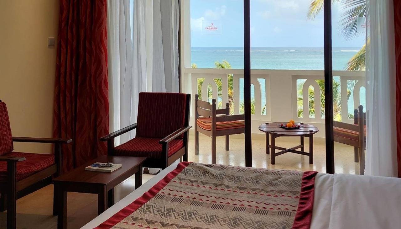 Prideinn Paradise Beach Resort & Spa Mombasa Exterior foto A room at the hotel